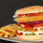 Maxi breaded chicken breast fillet burger - Délices & Snacks